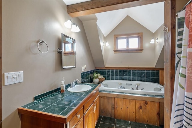 full bath featuring tile patterned floors, lofted ceiling, a tub with jets, and vanity