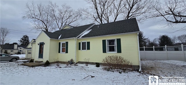 exterior space with entry steps and fence