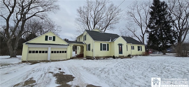 bungalow-style home featuring an attached garage