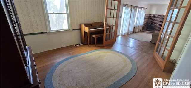 1620 Haskell Rd, Portville, NY 14760 - bathroom with french doors, a wainscoted wall, and wallpapered walls