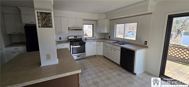 1620 Haskell Rd, Portville, NY 14760 - kitchen with light floors, a sink, under cabinet range hood, dishwasher, and gas range