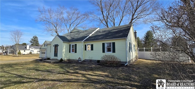 1620 Haskell Rd, Portville, NY 14760 - view of front facade featuring a front lawn, fence, and roof with shingles