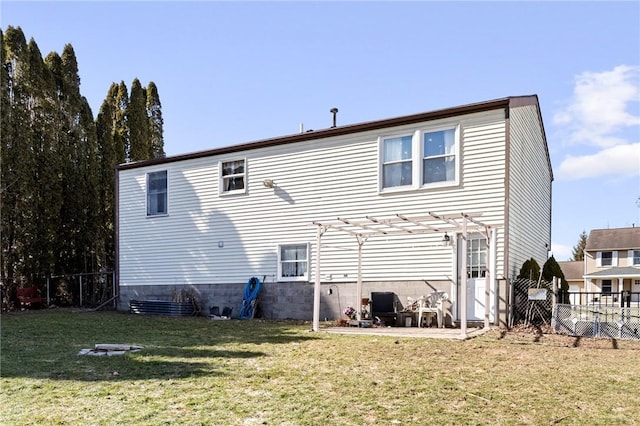 back of property featuring a yard, a patio area, a pergola, and fence