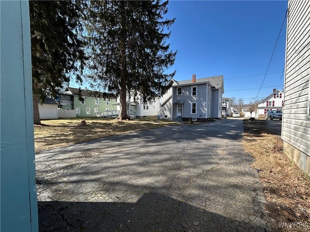 view of road with a residential view