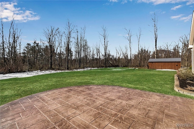 view of patio with an outdoor structure