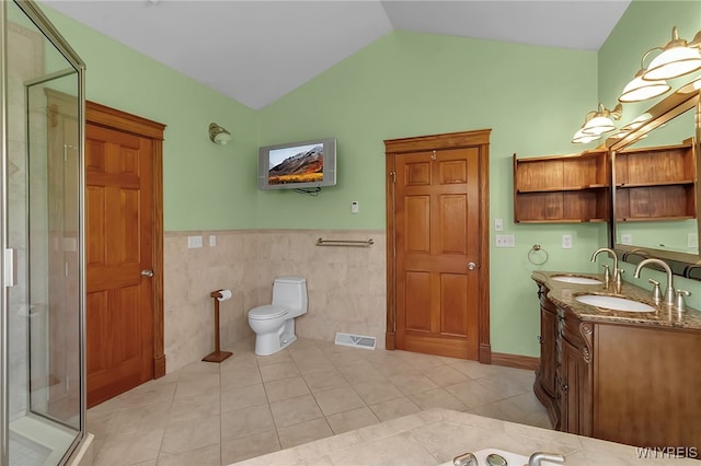 full bath featuring tile patterned flooring, a shower stall, vanity, and visible vents