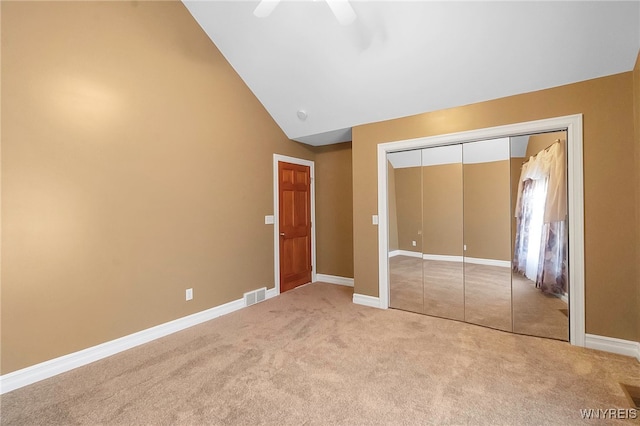 unfurnished bedroom featuring visible vents, baseboards, a closet, and carpet flooring