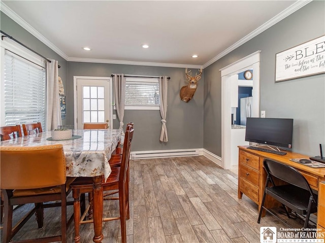 dining space with crown molding, baseboards, baseboard heating, recessed lighting, and light wood-style flooring