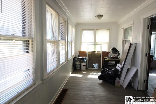 sunroom featuring visible vents