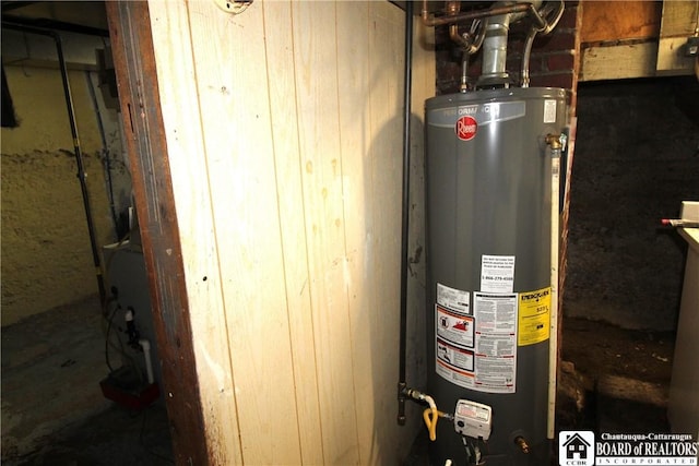 utility room featuring gas water heater