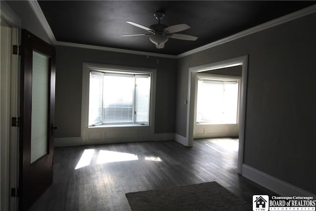 unfurnished room featuring a ceiling fan, a healthy amount of sunlight, and crown molding