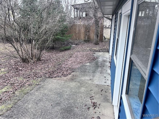 view of yard with a patio area and fence