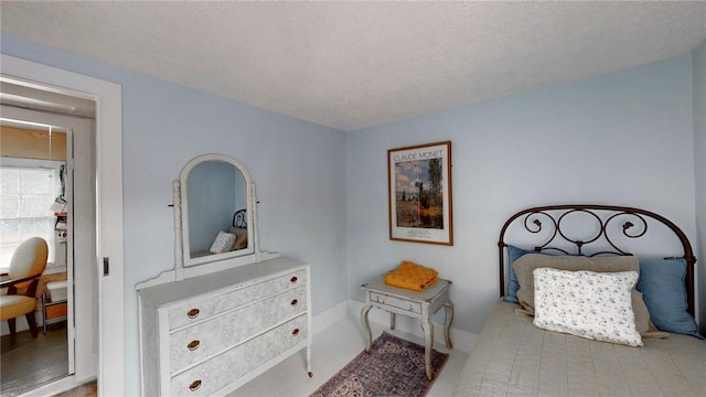 bedroom with a textured ceiling