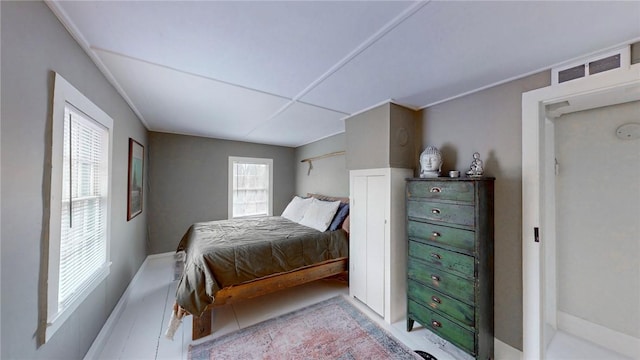 bedroom featuring visible vents