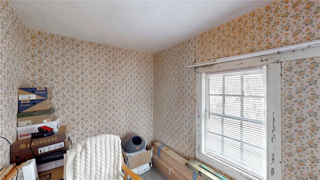 misc room featuring wallpapered walls