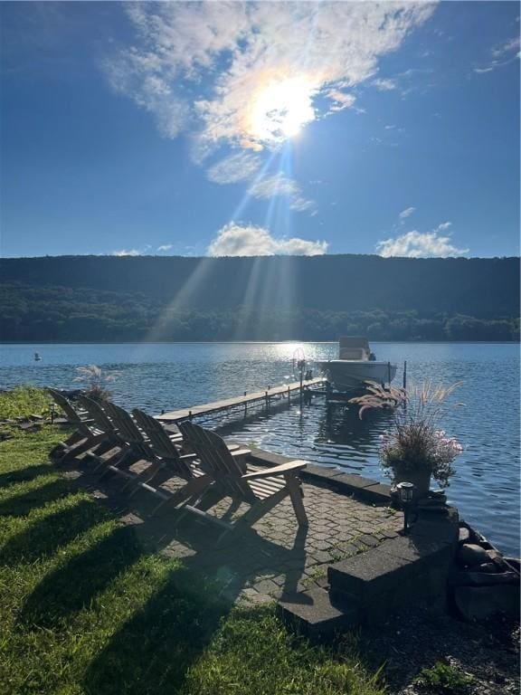 view of dock with a water view