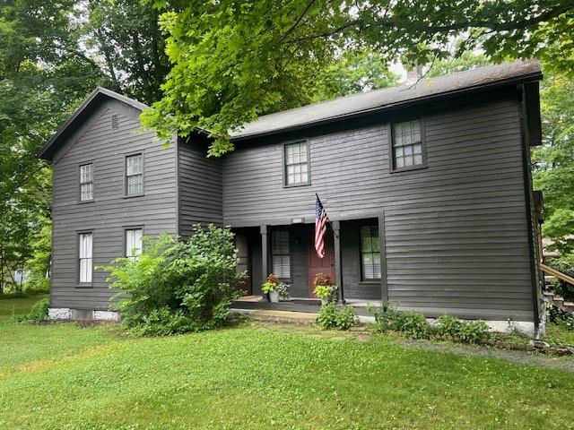 14838 W Lake Rd, Pulteney, NY 14418 - view of front of house featuring a front lawn and covered porch