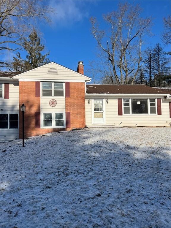 153 Holden Rd, Southport, NY 14871 - rear view of house with a chimney