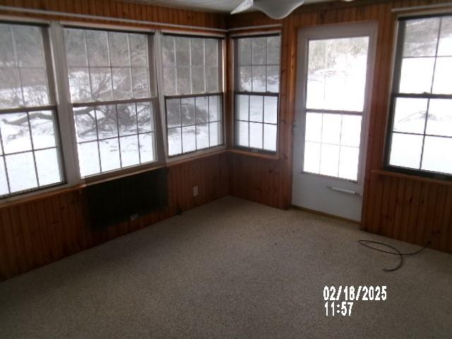 153 Holden Rd, Southport, NY 14871 - unfurnished sunroom with ceiling fan