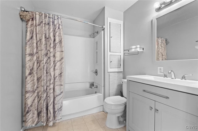 bathroom with tile patterned floors, vanity, toilet, and shower / tub combo