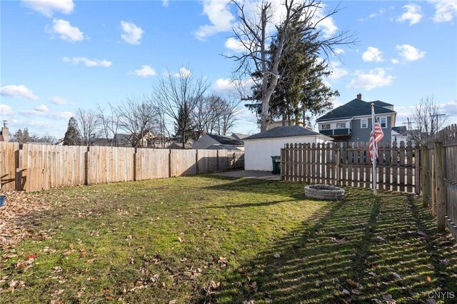 view of yard with a fenced backyard