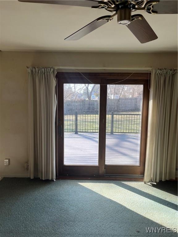 interior space with a ceiling fan