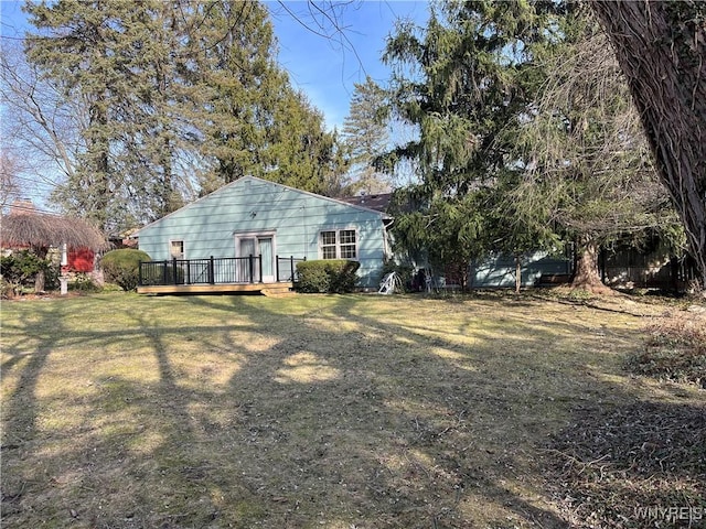 view of yard featuring a wooden deck