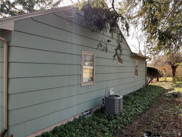 view of property exterior with central AC unit