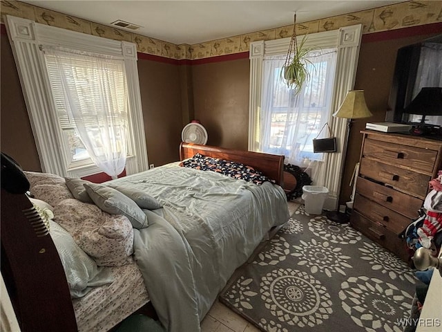 bedroom with visible vents