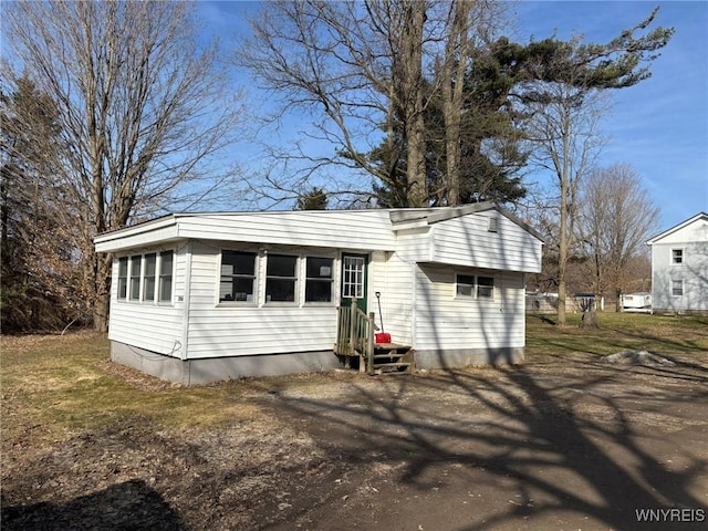 view of front of home with entry steps