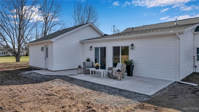 rear view of property with a patio area