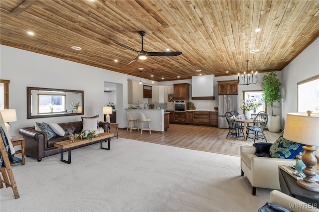 living area with light wood finished floors, recessed lighting, wooden ceiling, and ceiling fan