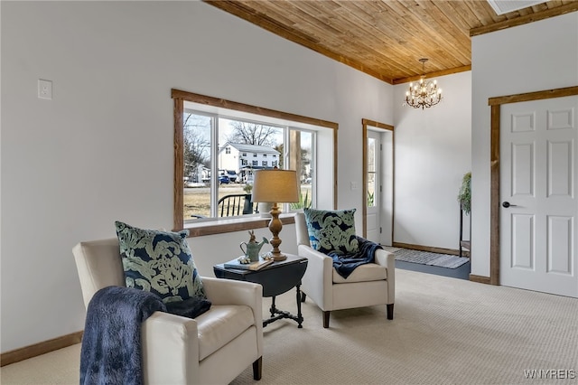 living area featuring light carpet, a notable chandelier, wooden ceiling, and baseboards