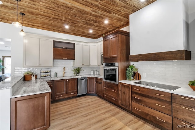 kitchen with black electric stovetop, stainless steel oven, wooden ceiling, wall chimney exhaust hood, and a sink