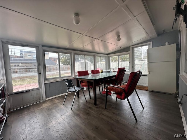 sunroom / solarium with lofted ceiling