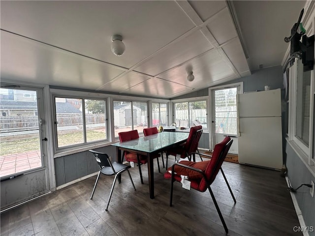 sunroom / solarium with lofted ceiling