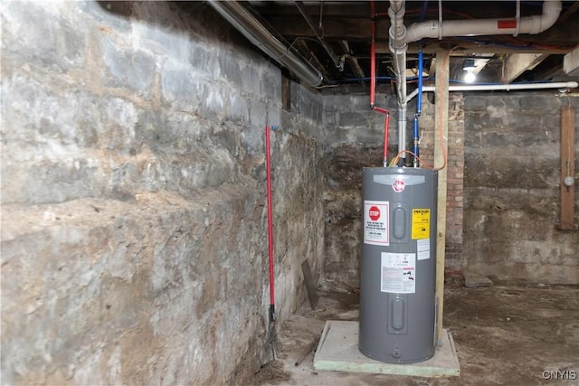 utility room featuring electric water heater