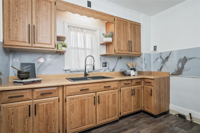 kitchen with dark wood finished floors, open shelves, light countertops, and a sink