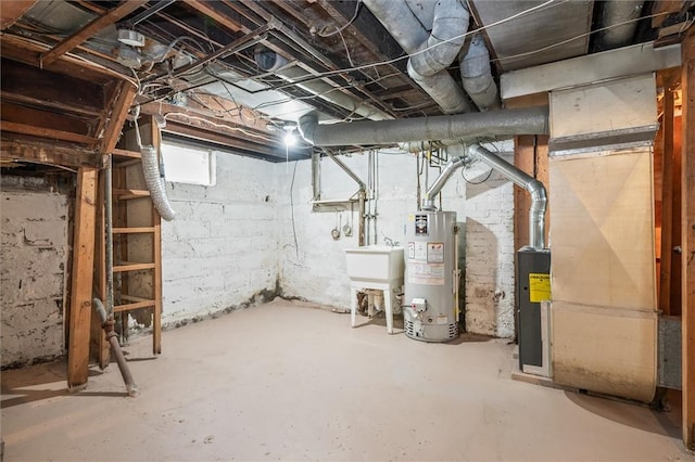 basement with water heater and a sink