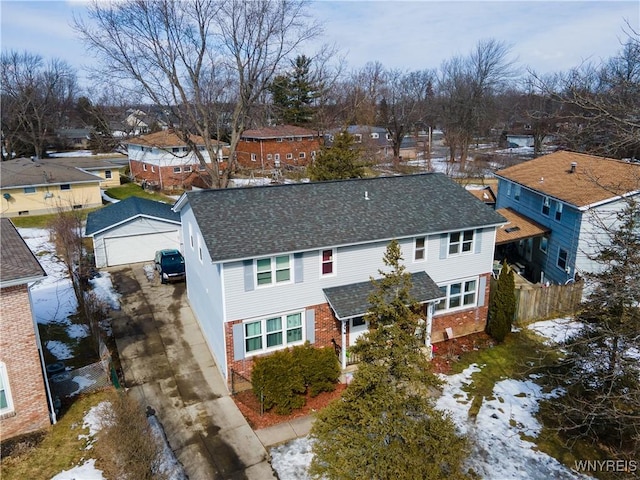 birds eye view of property with a residential view