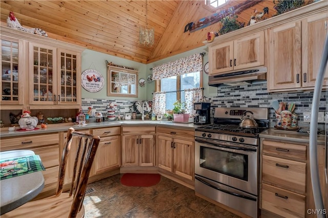 kitchen featuring stainless steel range with gas stovetop, vaulted ceiling, under cabinet range hood, wooden ceiling, and tasteful backsplash