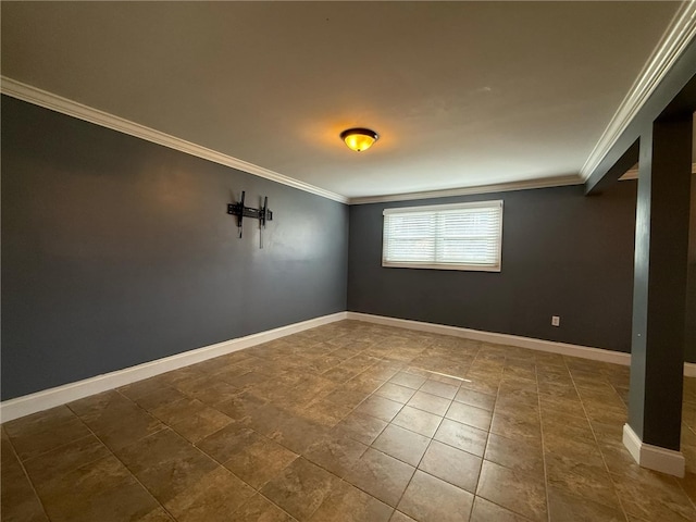 empty room with baseboards and ornamental molding