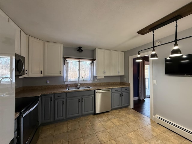 kitchen with gray cabinets, a sink, stainless steel appliances, white cabinetry, and baseboard heating