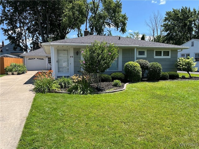 single story home featuring a front yard, fence, driveway, a chimney, and a garage