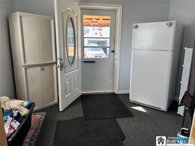 interior space with dark colored carpet