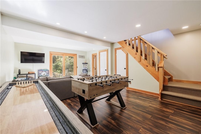 rec room with recessed lighting, dark wood-style flooring, and baseboards