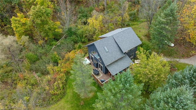 bird's eye view featuring a forest view