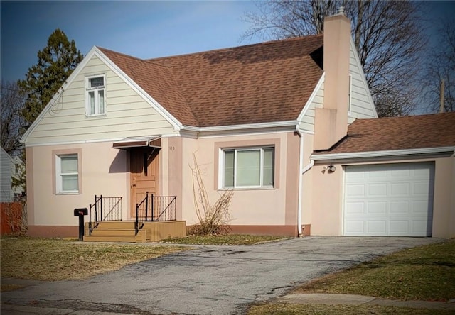 view of front of property with stucco siding, aphalt driveway, an attached garage, a shingled roof, and a chimney