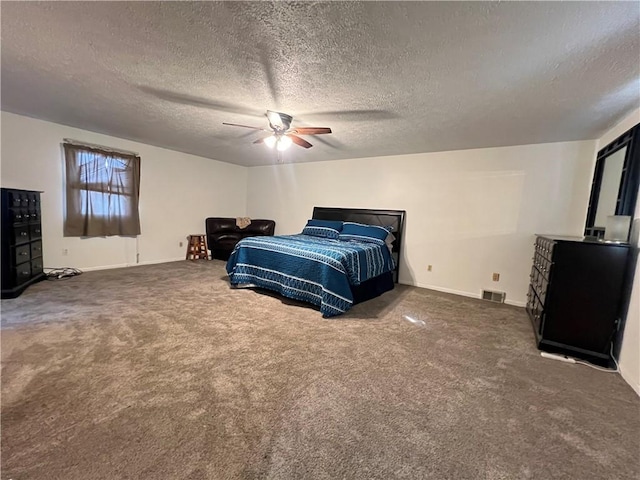 carpeted bedroom with visible vents, baseboards, a textured ceiling, and ceiling fan