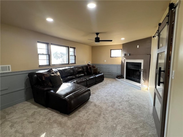 living room featuring recessed lighting, visible vents, carpet floors, and ceiling fan